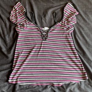 Large gray, pink, black and white striped shirt
